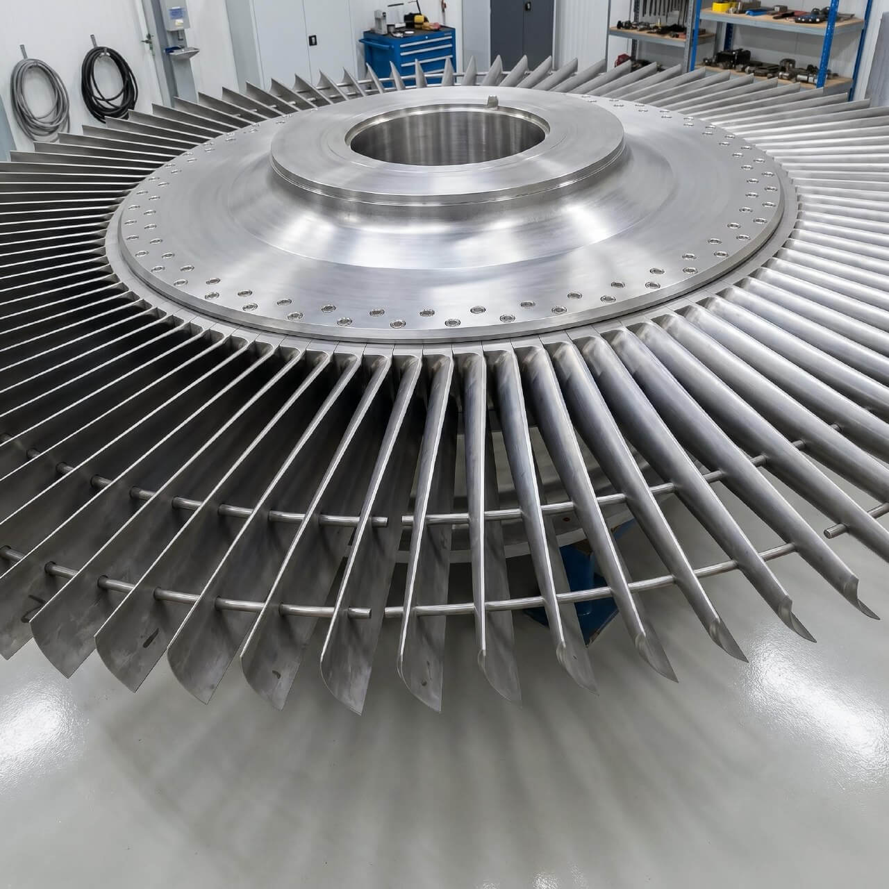 Steam turbine blades and rotor discs
